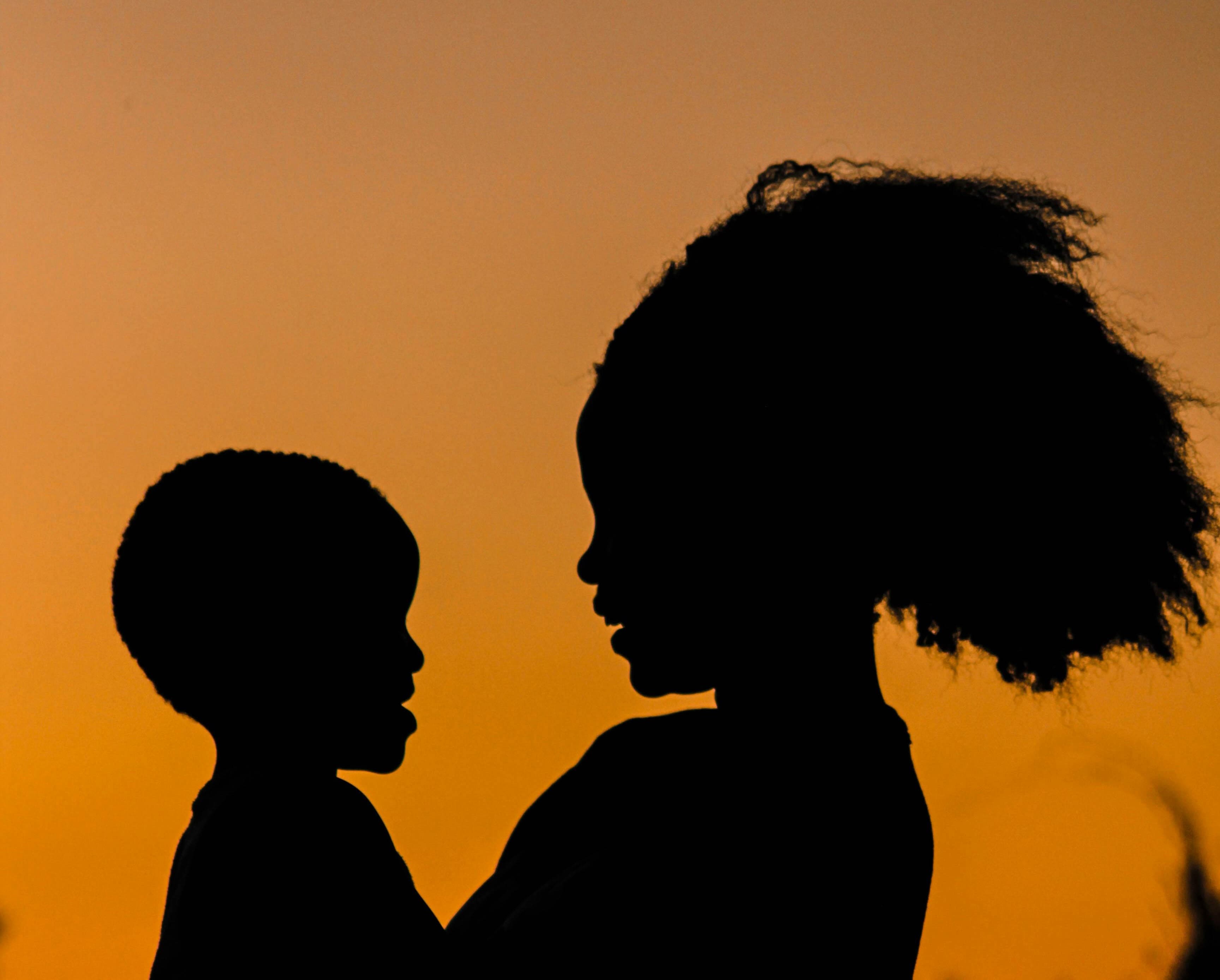 Mother aand child silhouette photo